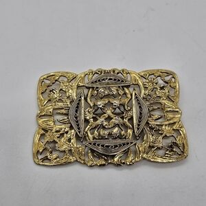 vintage gold tone rectangular pin with cutouts flower motifs